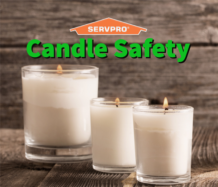 Three candles in a home that are following candle safety practices.