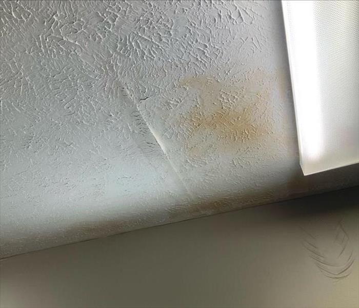 Water damage on a restaurant ceiling